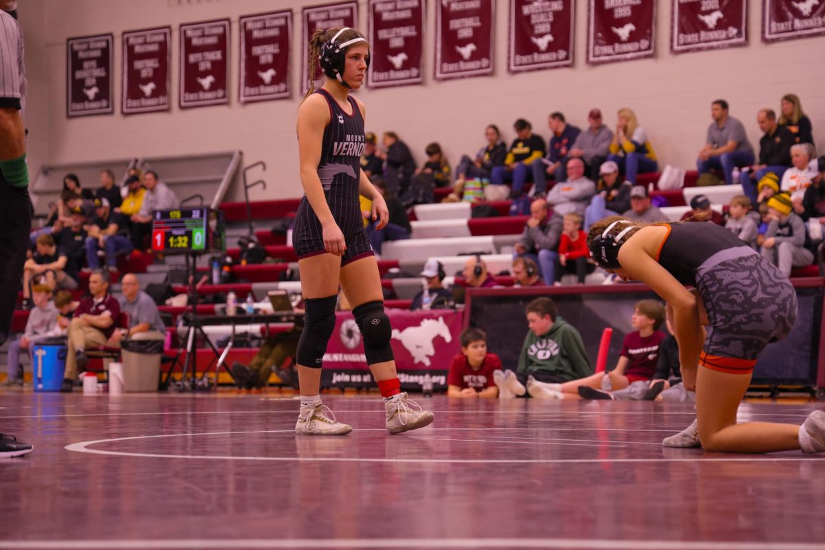 Junior Kiersten Swart ranked #4 in 110lbs (Class 1A) prepares for her match against her opponent from Grinnell, Jan. 9. 