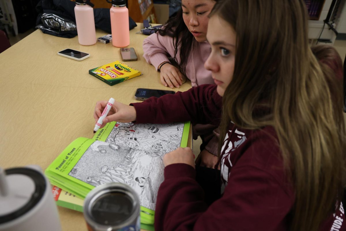 Senior Eryn Jackson colors in her coloring book during her Farm to Table J-Term course, Jan. 10. 