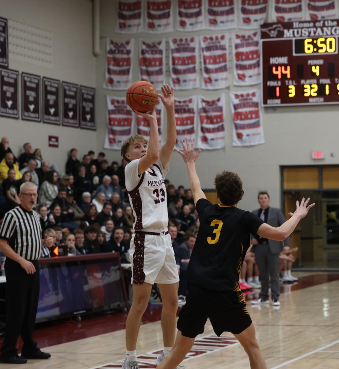 Sophomore Seth Rushford shoots a three pointer. 