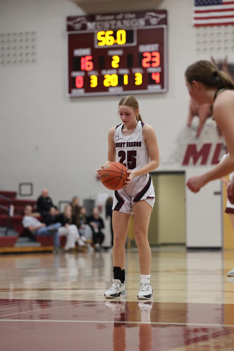 Freshman Ella Wilson (25) shoots a free throw after being fouled on Jan. 15. 