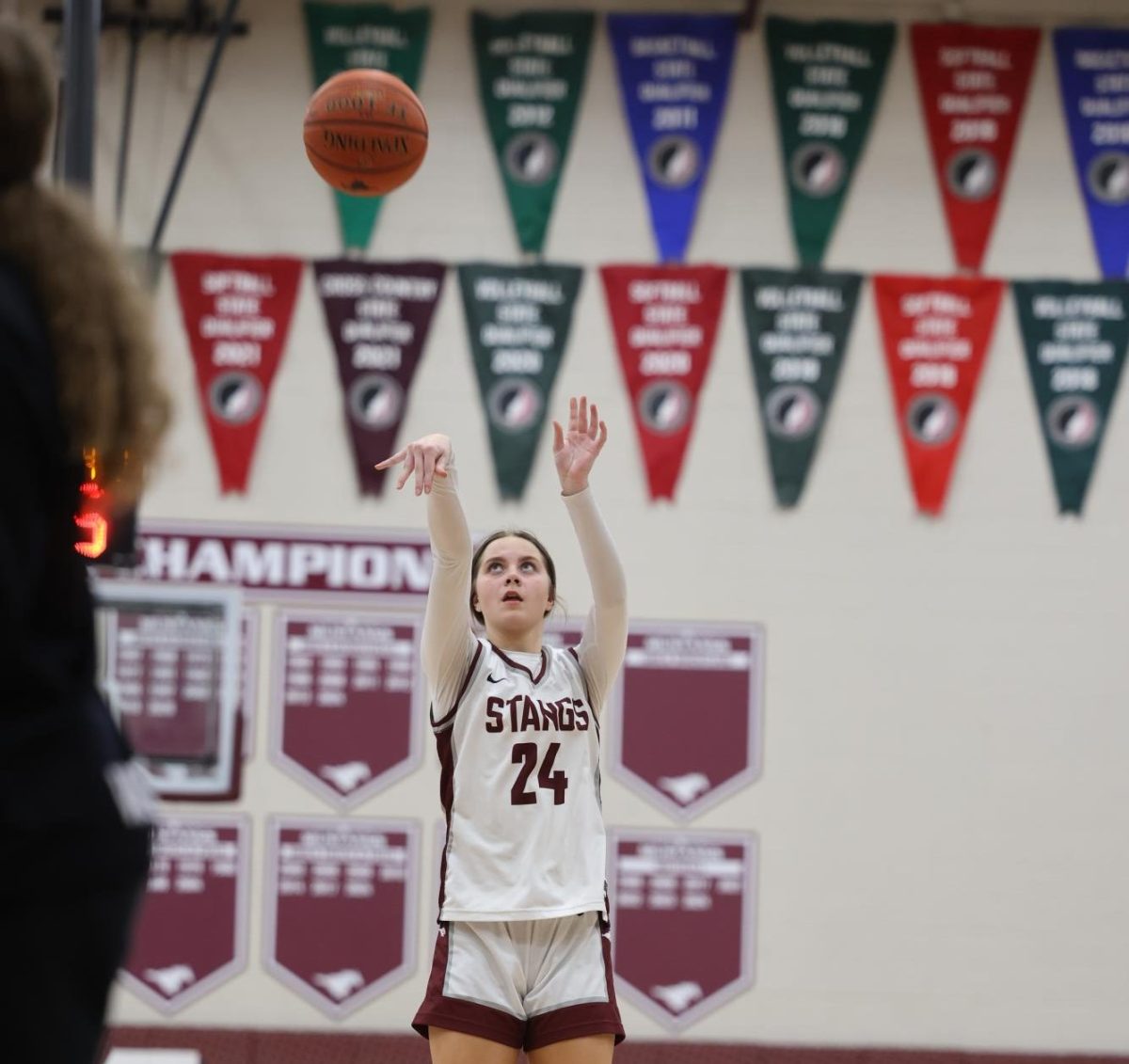 Sophomore Rylee Rasmussen (24) shoots a 3 pointer against Center-Point Urbana, Jan. 15. 