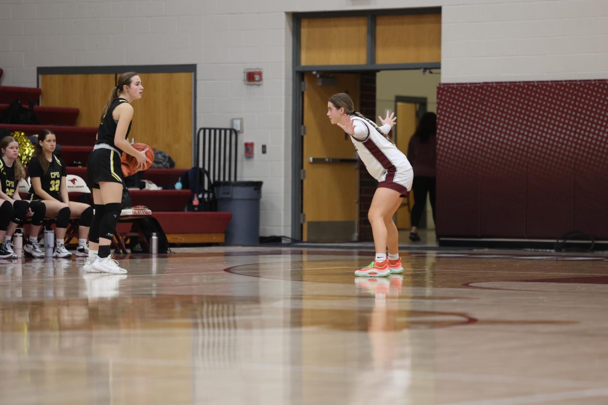 Sophomore Rylee Rasmussen stares down her opponent during her game on Jan. 15. 