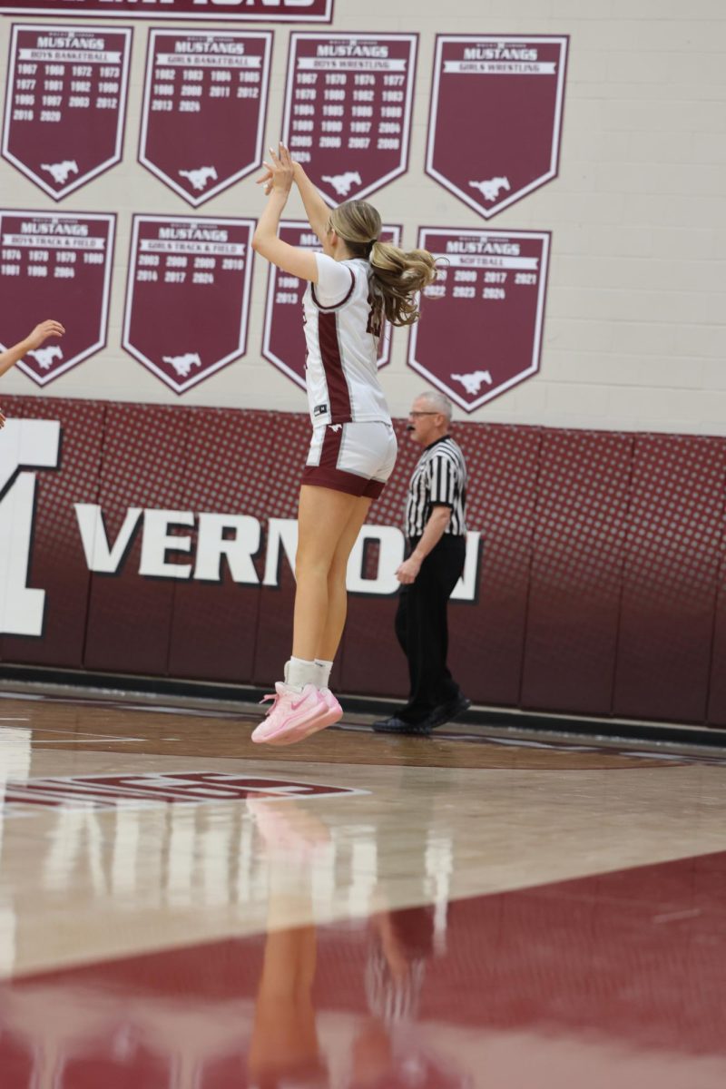 Senior Sydney Huber (23) shoots a 3 pointer against Center-Point Urbana, Jan. 15. 