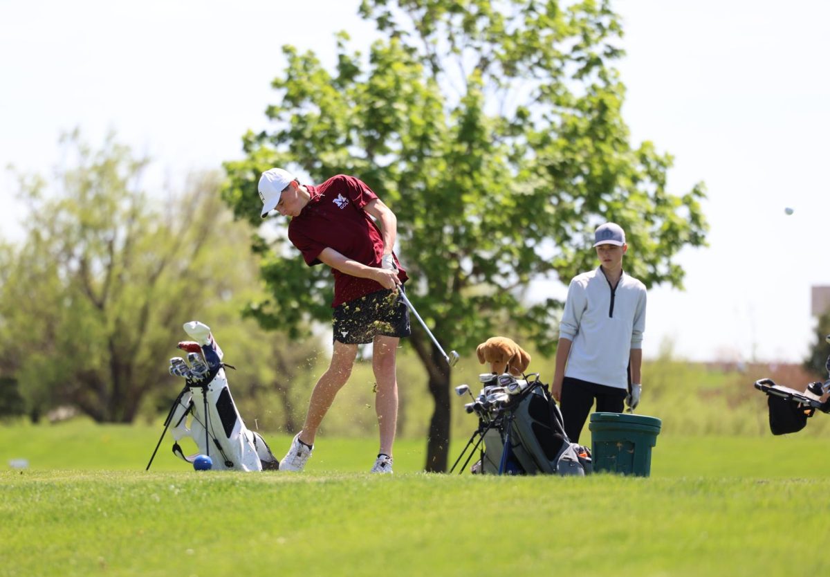 Tommy Rhomberg golfs at the 2024 WaMac meet.