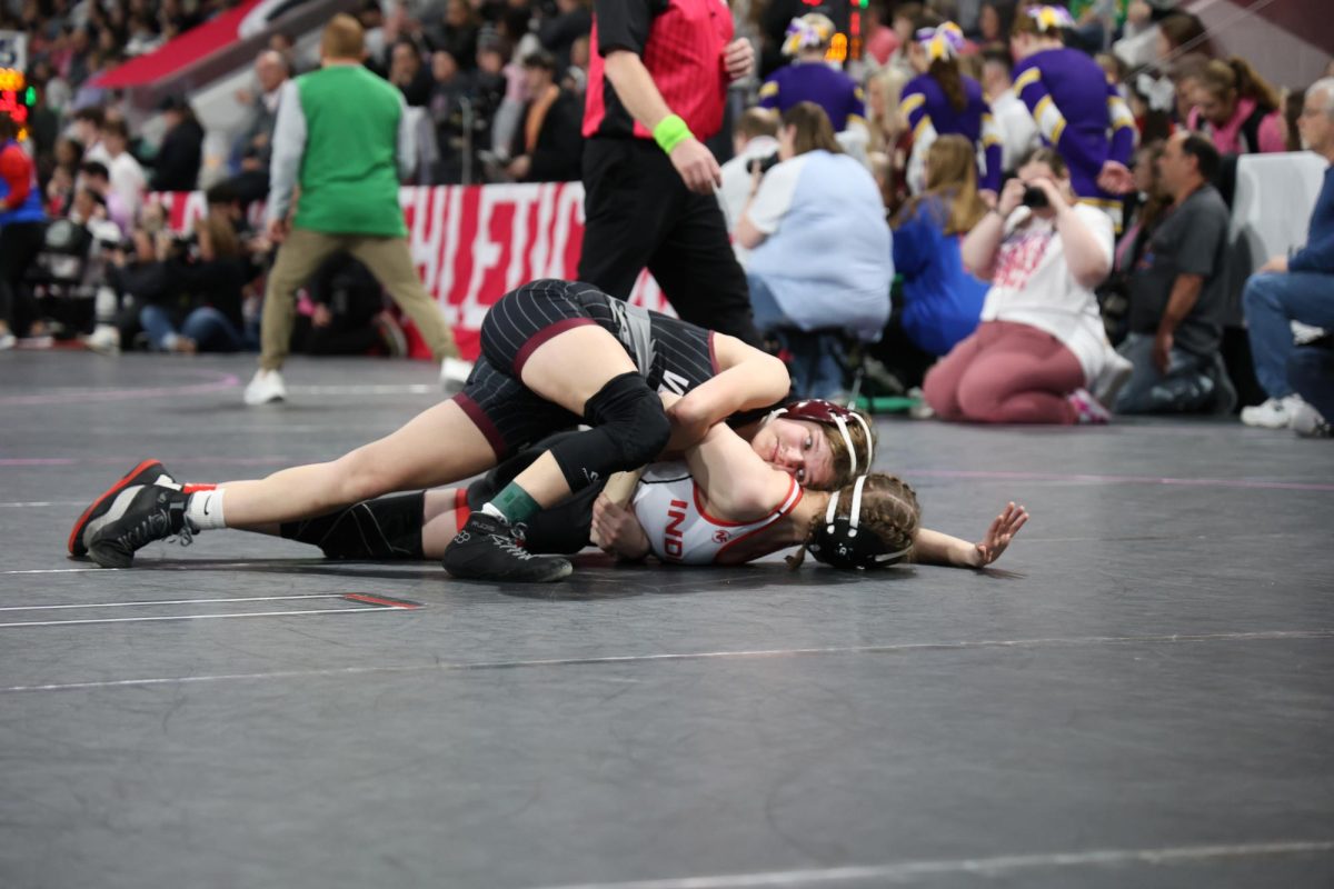 Freshman Kate Martin (105) wrestles Feb. 7.