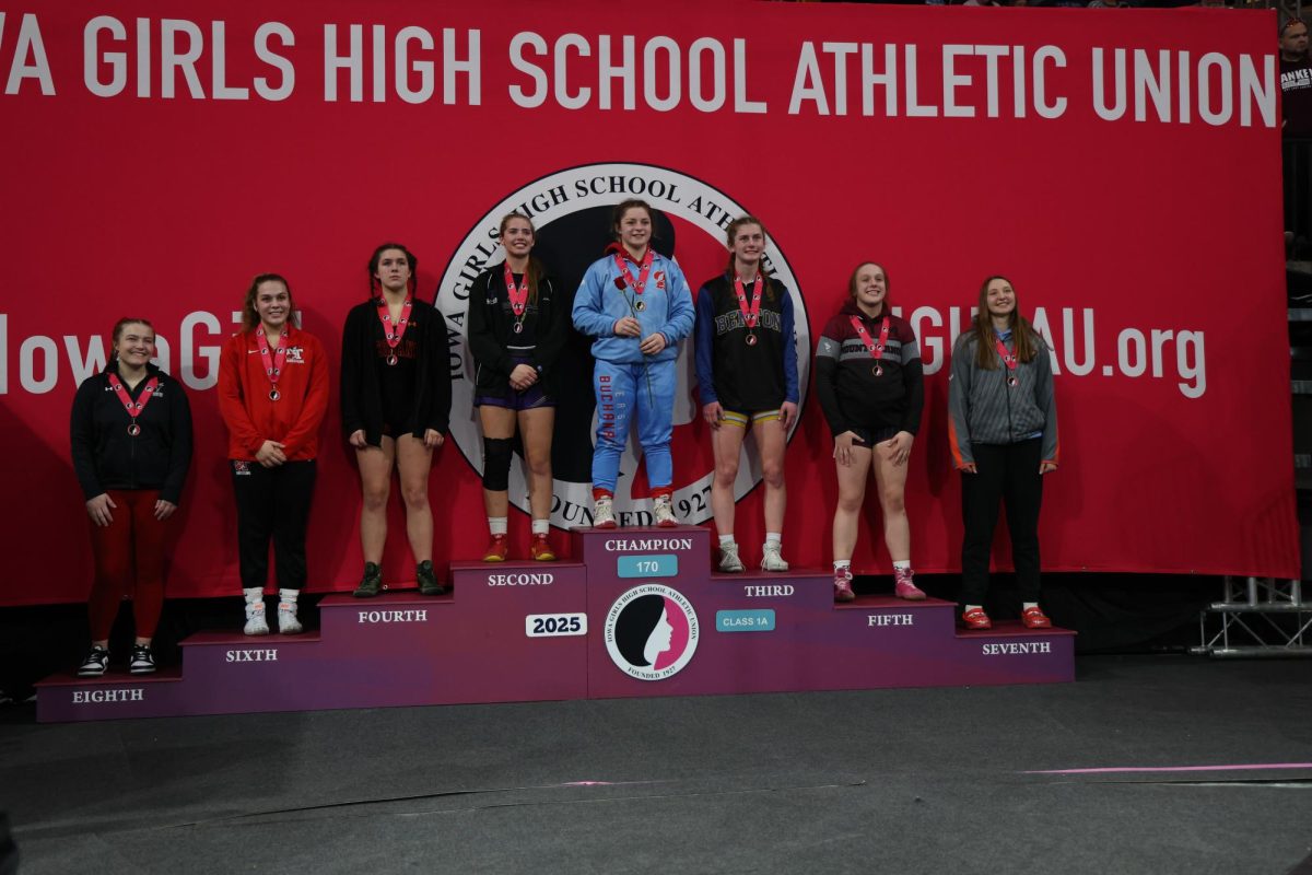 Gracie Pinckney (170) is on the podium for 5th place in Class 1A State Wrestling Feb. 7.