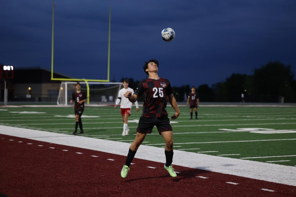 Junior Jaxon Anderson gains control of the ball in the 3A Regional Semifinal win against Fort Madison. The Mustangs won 5-1.