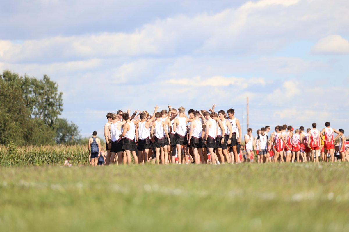 MVL Boys Cross Country team huddles together for a word before their race on Aug. 26th. 