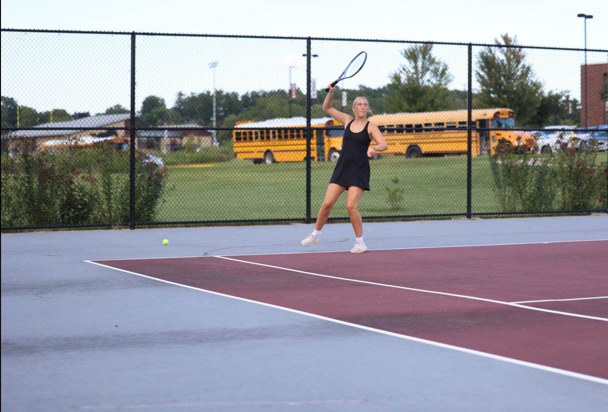 Senior Alyassa Bohlkn get ready to return the ball. The Mustangs beat Independence 7-2 Aug. 28. 