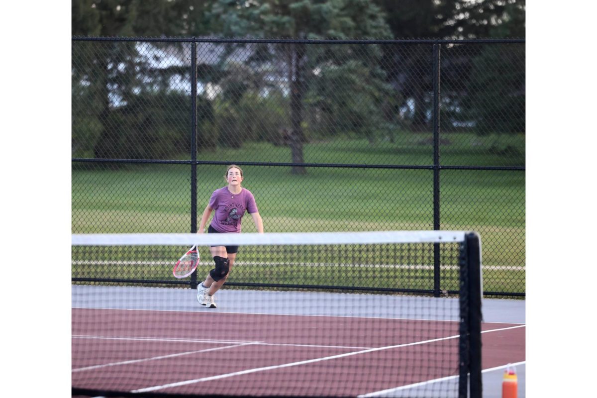 Junior Avery Thurn spots the ball in the air. The Mustangs beat Independence 7-2 Aug. 28. 