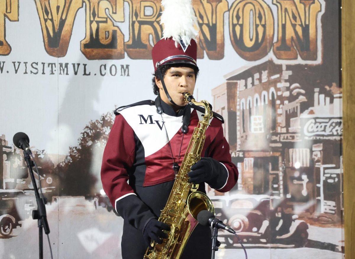 Junior Jonathan Winkler performs his solo during 'You Will Be Found'. 