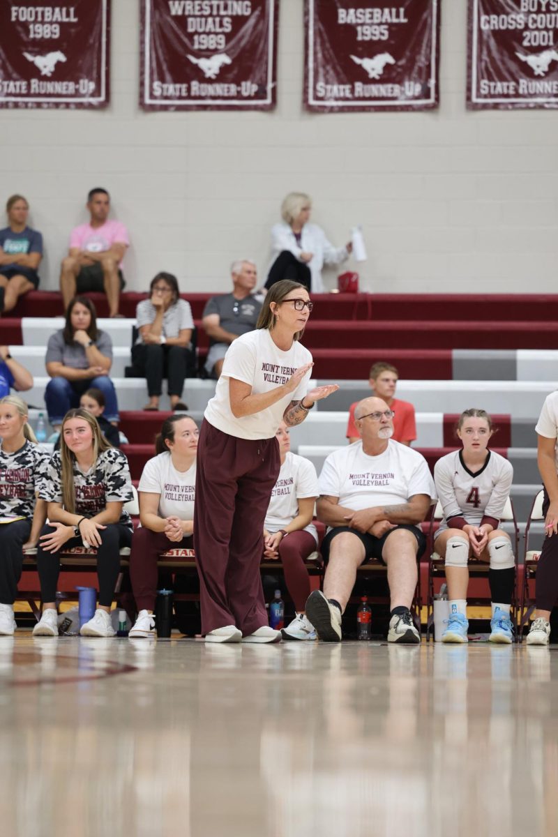Head Coach Maggie Willems encourages her team during their game. 