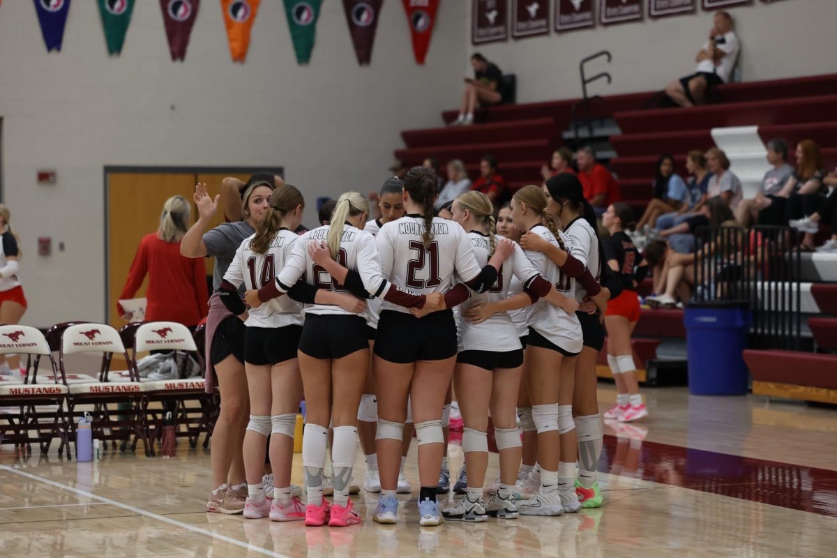 JV Volleyball Huddles up during the Sept. 29 quad. 