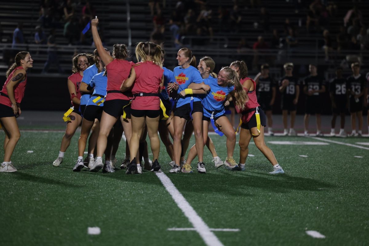 The Bikers steal a flag from the Surfers after their attempt to make human shield around the ball carrier Oct. 2. 
