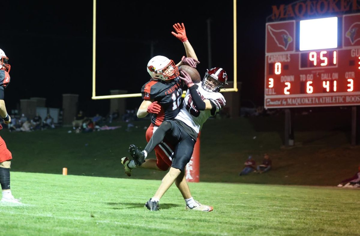 Holden Hlavacek makes a TD catch in the 50-0 win against Monticello.