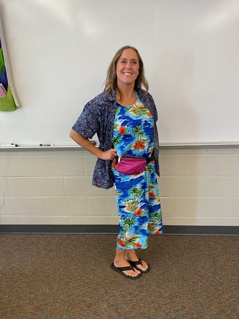 Spanish Teacher Erica Nichols poses in her summer outfit for the seasons day on Oct. 2.