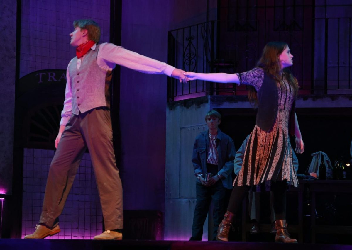 Juniors Chester Rood and Charlotte Woosley, as Orpheus and Eurydice, dance together for "All I've Ever Known".