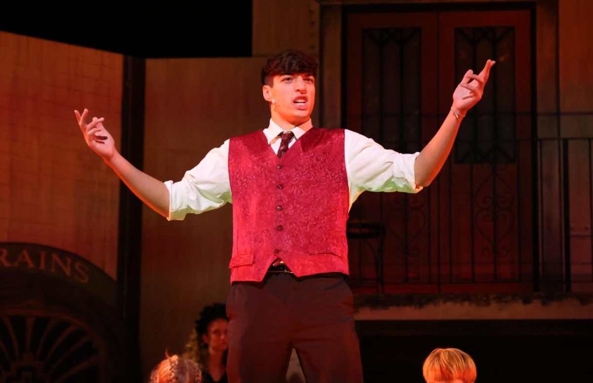 Senior Charlie Weldon (Hades) boasts his power during "Chant (Reprise)".