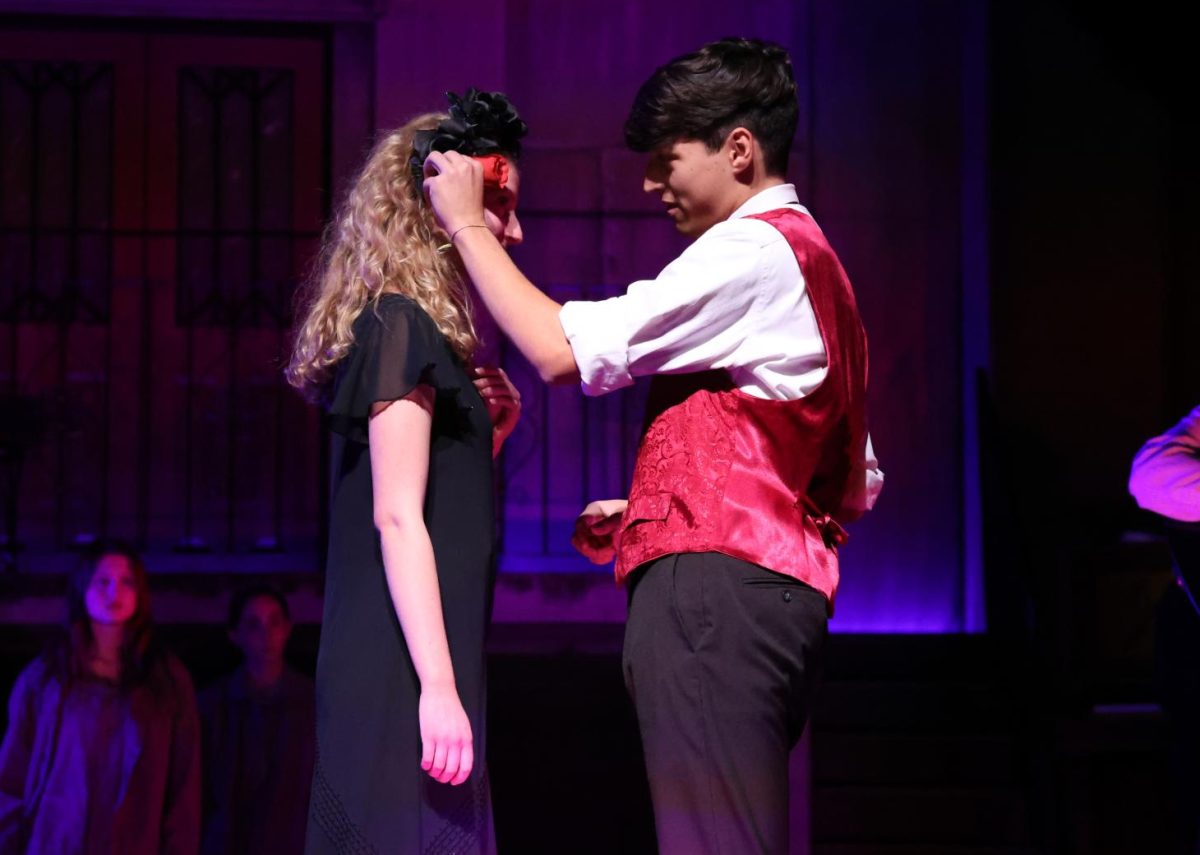 Seniors Charlie Weldon (Hades) and Claire Jensen (Persephone) rekindle their flame at the end of "Epic III".
