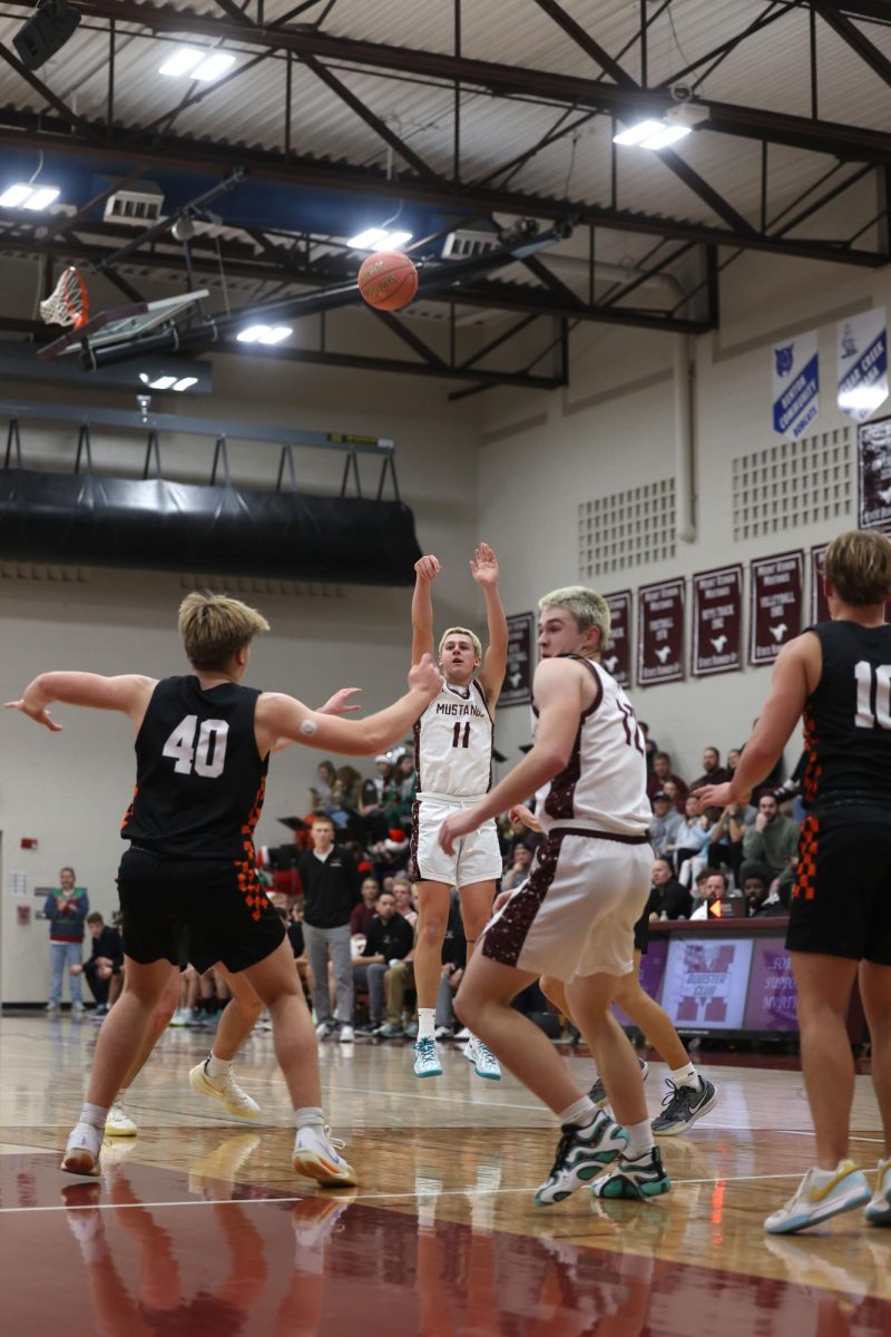 Kellen Haverback takes a shot against Solon Dec. 17, 2024