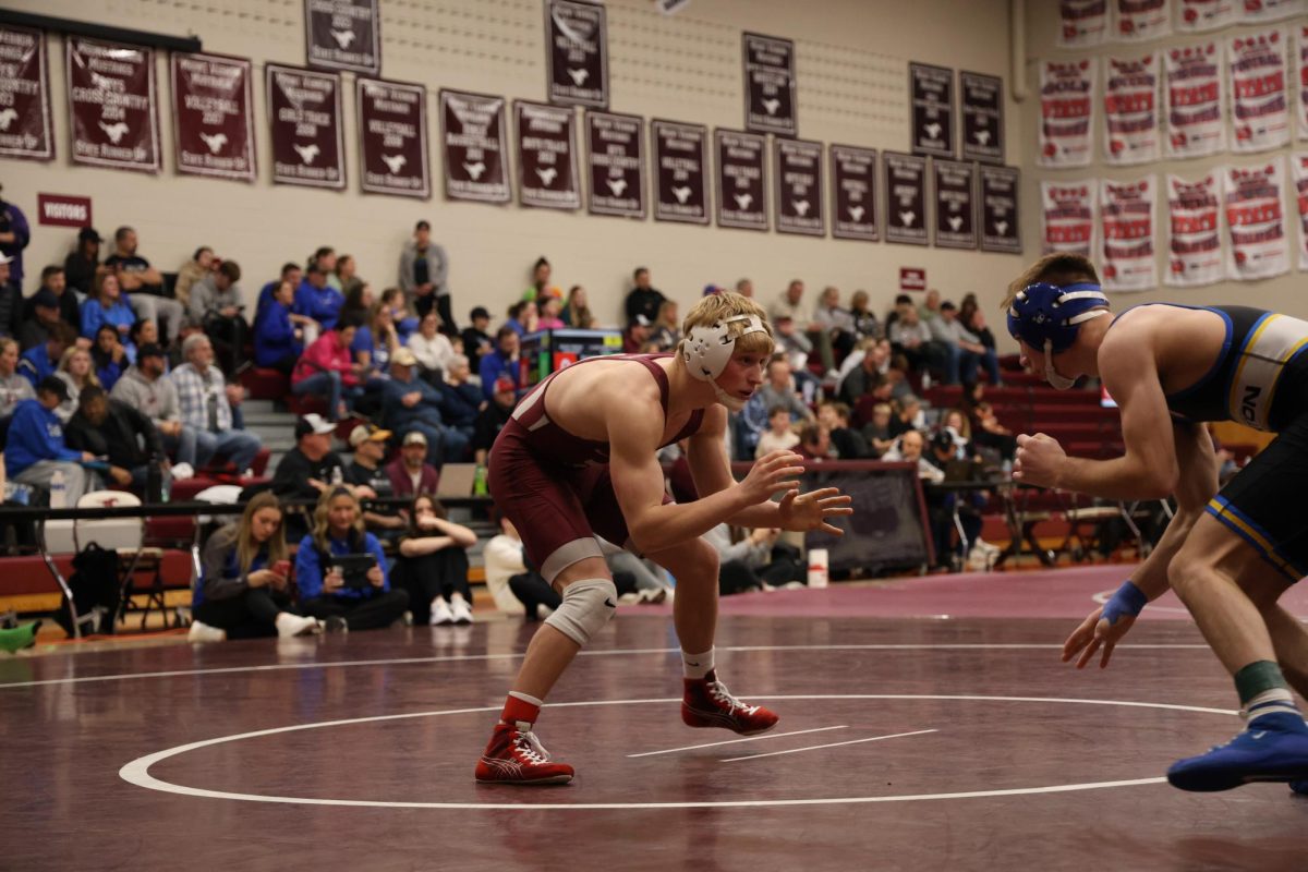 Mount Vernon's Nolan Mercer faces off against a student from Benton High School during the Jan. 8 Wrestling Triangular.
