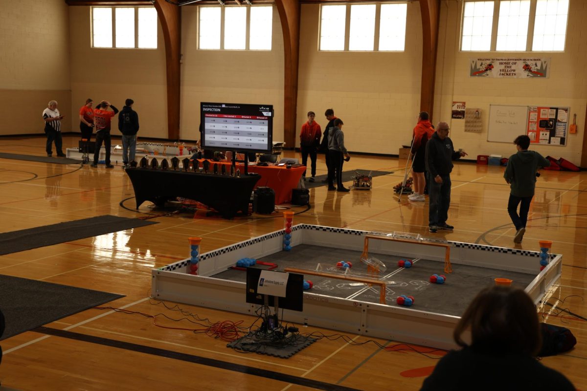 Students from several different schools prepare to compete at the Council Bluffs Robotics Tournament.