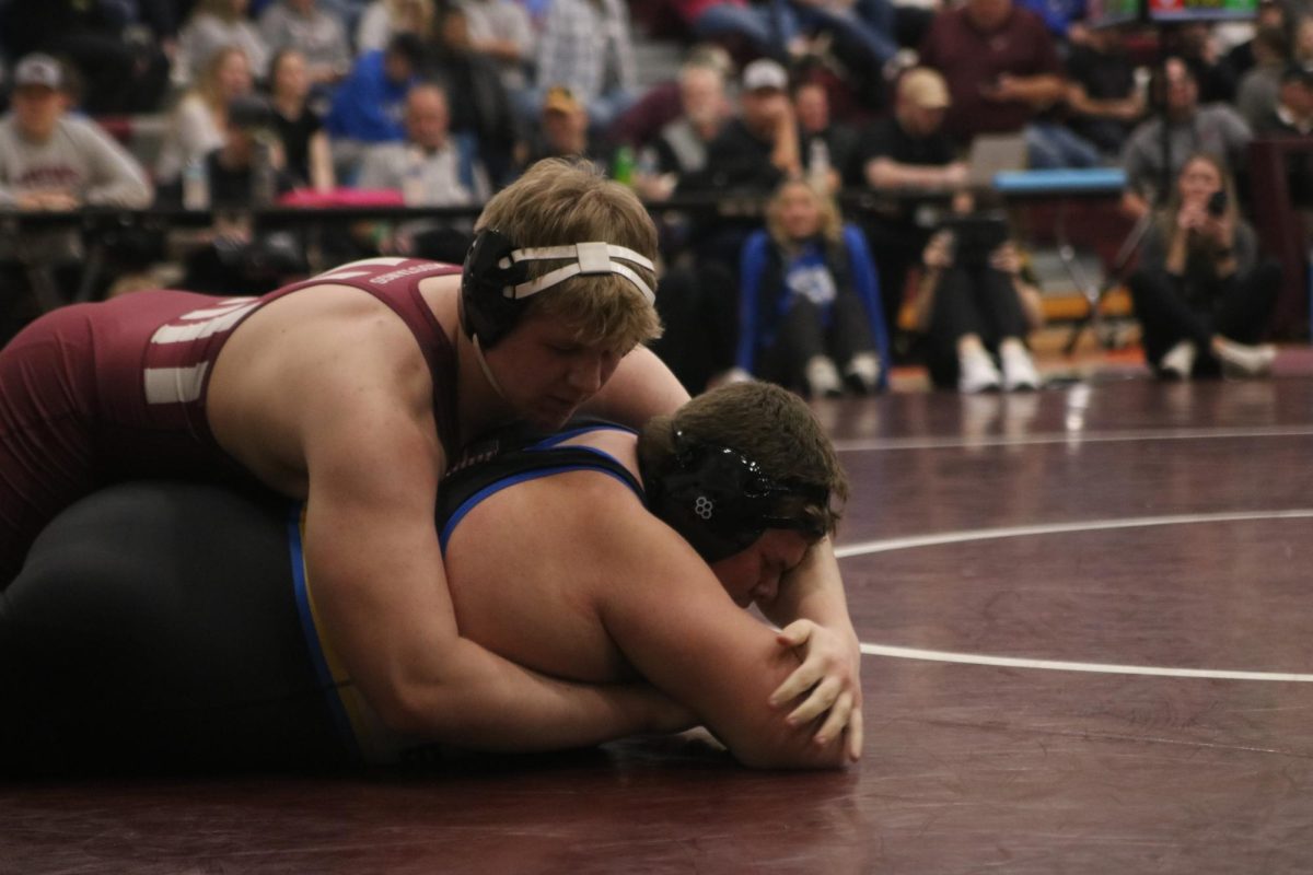 Freshman Beckett Curran (285) wrestles a Benton opponent on Jan 8.