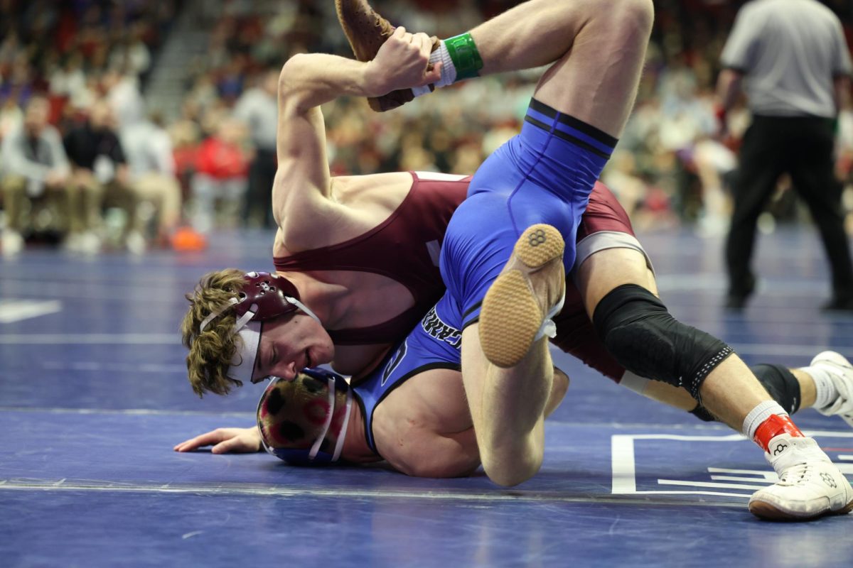 In 165-Championship Round 1 on the first day of Class 2A State Wrestling Feb. 19, Olyver Fuller (Camanche) 34-10 won by decision over Will Goodlove (Mount Vernon) 15-12 (Dec 21-18).