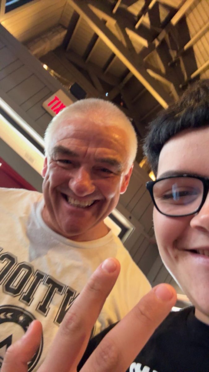 Social Studies teacher Ed Timm poses for a selfie with junior Juan Ochoa.