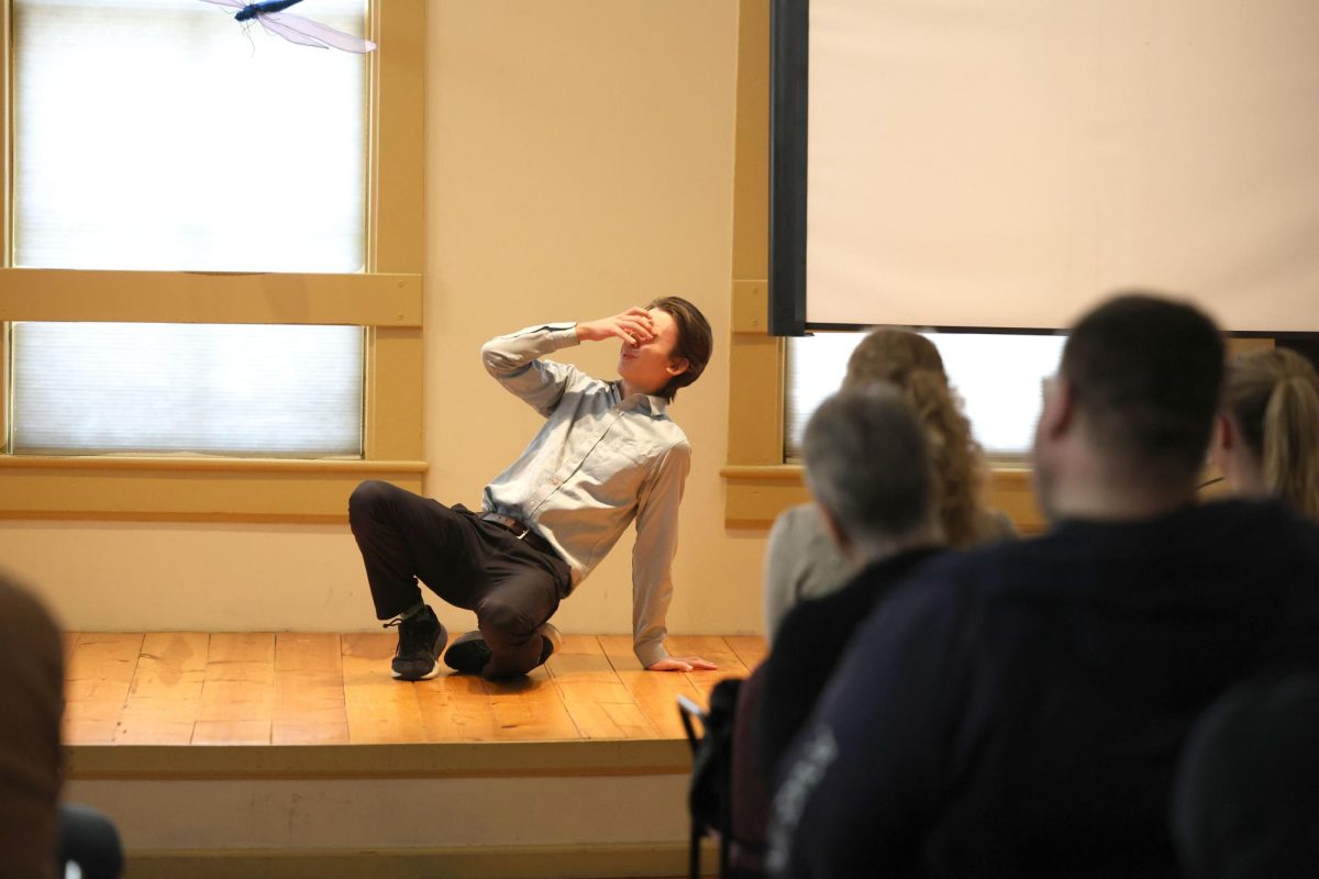 Sophomore Elliott McNulty stumbles after having an intense massage during his Improv. 