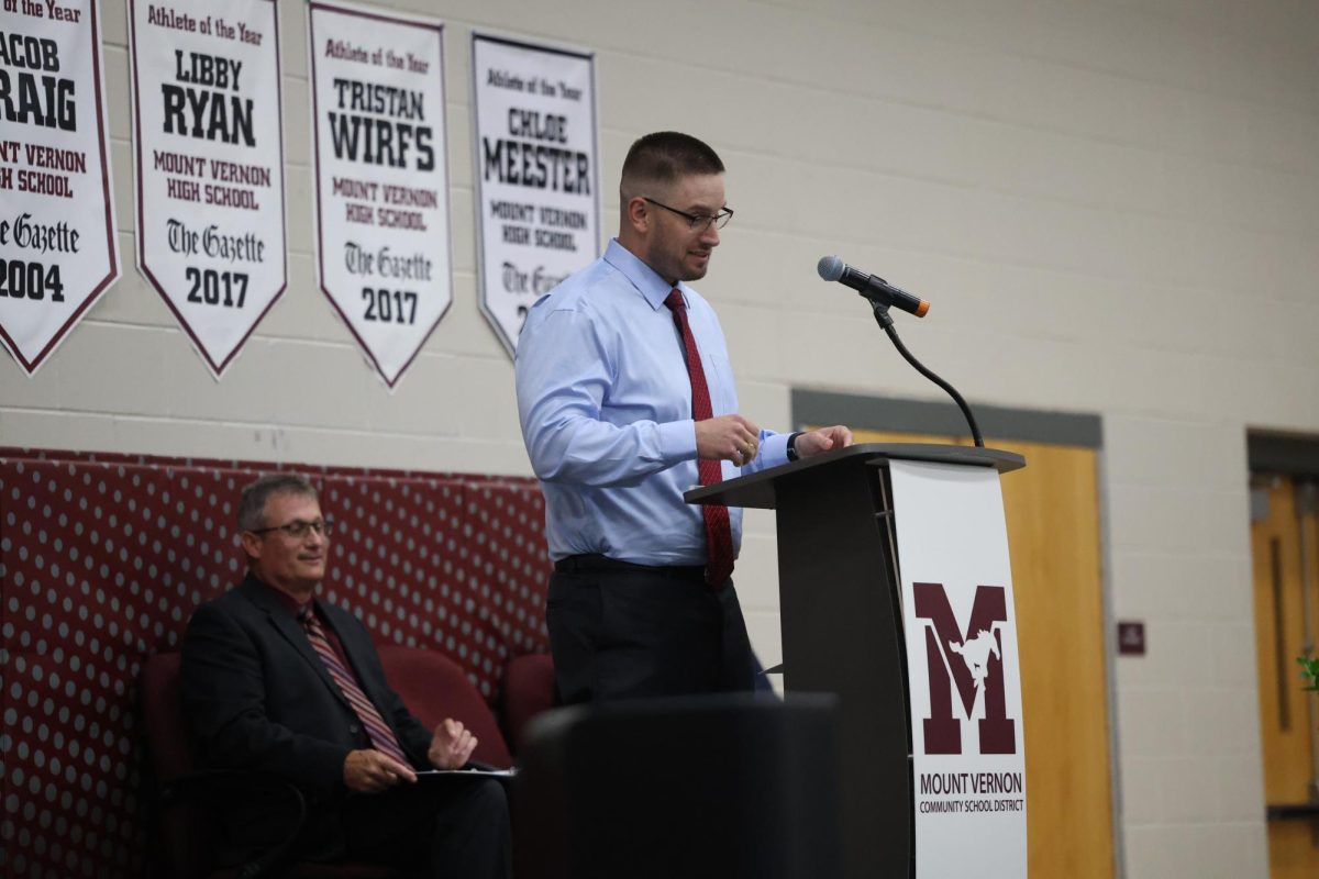 Math teacher Nate Namanny delivers his commencement keynote.